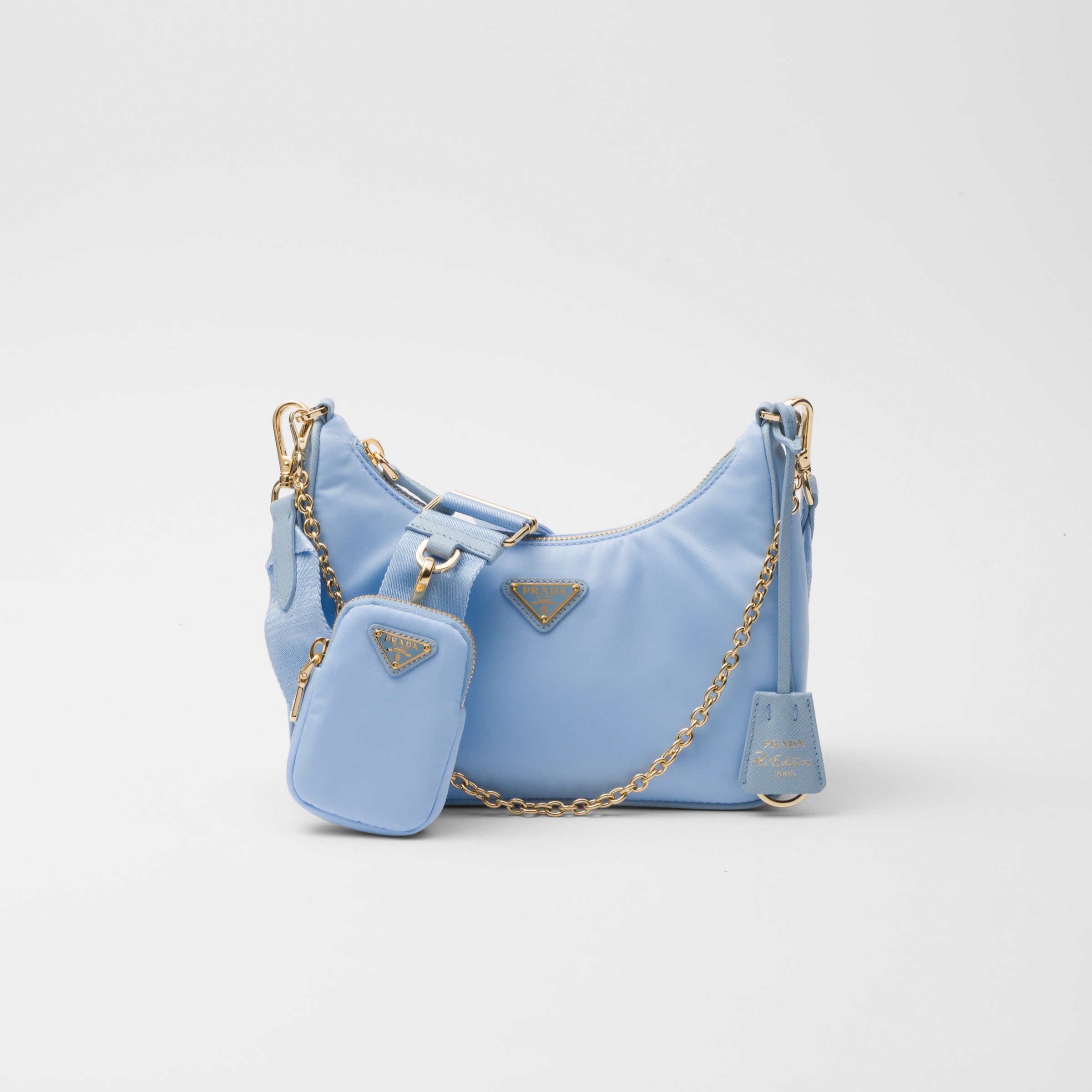 RE-EDITION 2005 RE-NYLON BAG  AND SAFFIANO MINI BAG, PALE BLUE