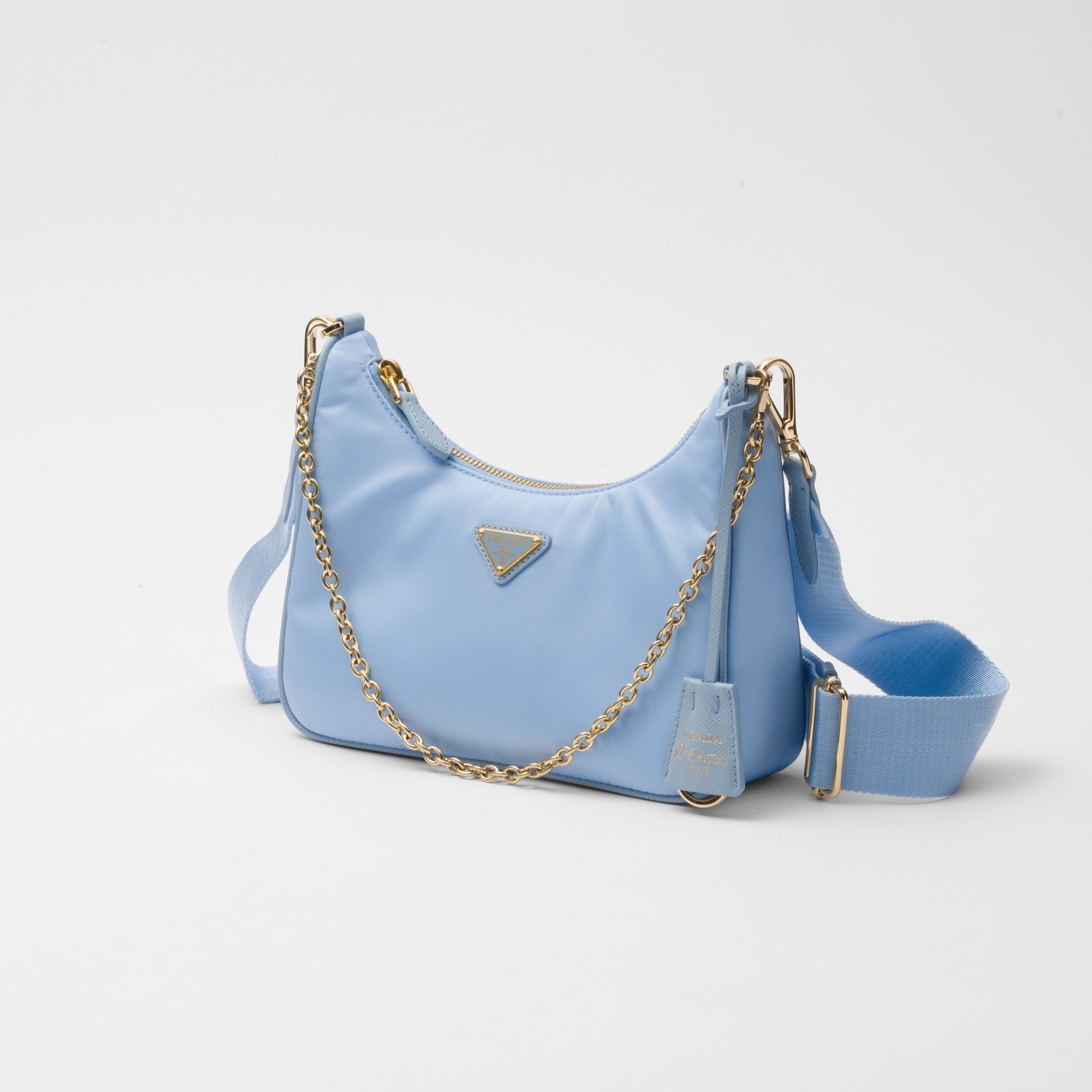 RE-EDITION 2005 RE-NYLON BAG  AND SAFFIANO MINI BAG, PALE BLUE