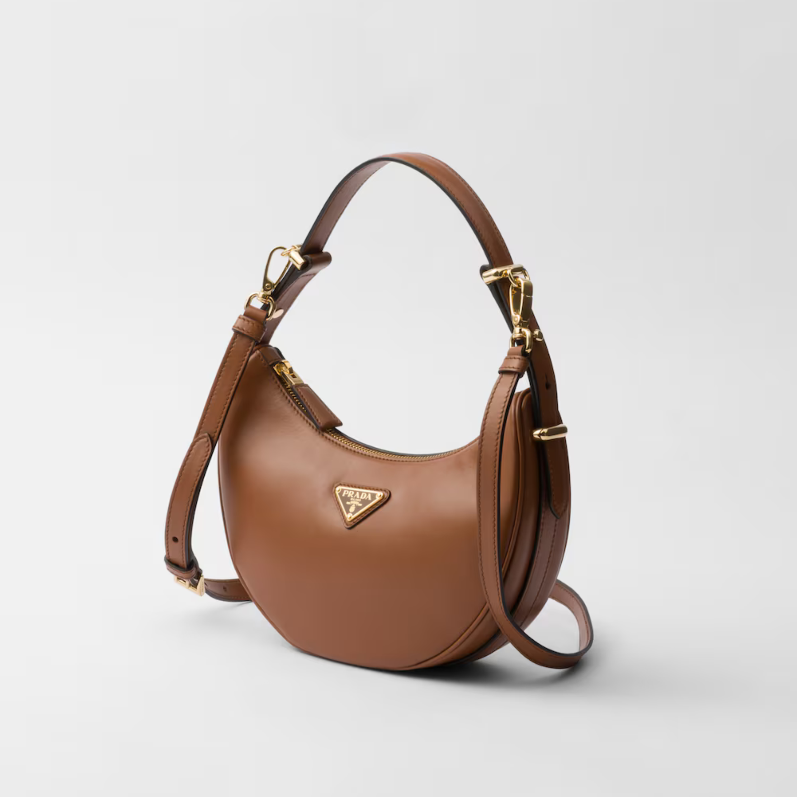 [PRADA] ARQUÉ SMALL LEATHER SHOULDER BAG, CALFSKIN – COGNAC